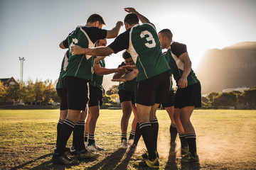 Wall Mural - Rugby players cheering together after the game