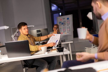 Wall Mural - business, deadline and technology concept - software developers discussing user interface design moc