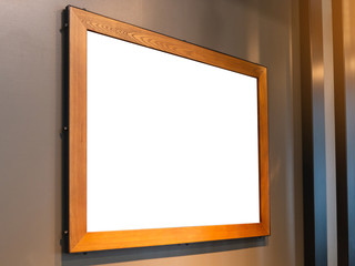 Mockup blank photo frames on the wall for your design