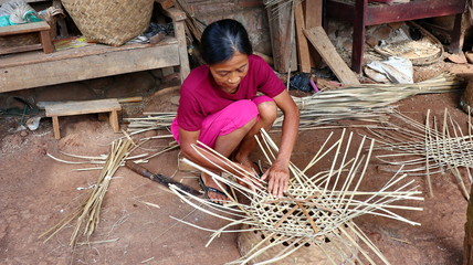 bamboo basket craftsman while doing his work in a place, Batang / Jawa Tengah - Indonesia, May 26, 2019