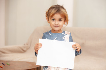 Wall Mural - happy girl with white sheet in hands