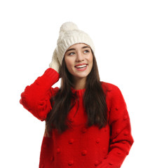 Sticker - Young woman wearing warm clothes on white background. Winter season