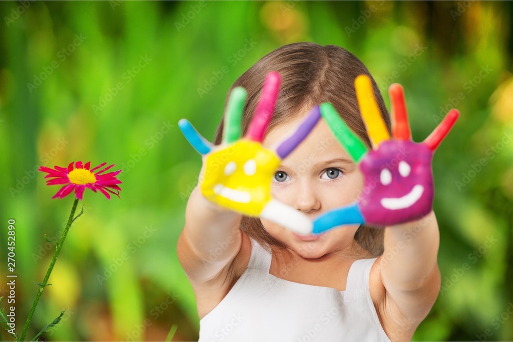 Cute little girl with colorful painted hands on  background - obrazy, fototapety, plakaty 