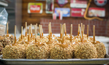 Close Up Of Caramel Apples With Nuts