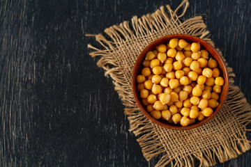 Poster - chickpeas on wooden surface