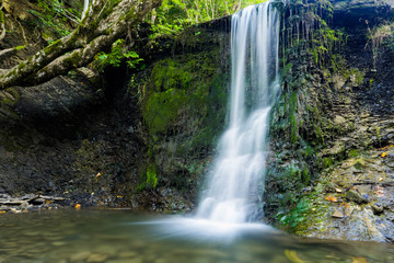  waterfall flowing on te rocks