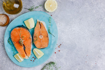 Wall Mural - Raw salmon fish steaks with ingredients