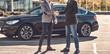 © Fxquadro - Photo of two smart elegant men, which have a deal about car. They are doing handshake.