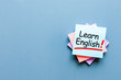 Learn english - note at blue background with empty space for text