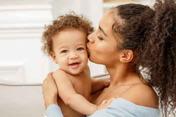 love of a mother and baby. family in the house. lifestyle