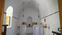 Greek Christian Orthodox Chapel In Church Entrance On Small Idyllic Island In Aegean Sea Pull Back Shot