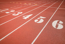 Red Running Track, Track And Field Or Athletics Track Start Line With Lane Numbers