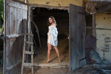 Young Girl In Old Barn