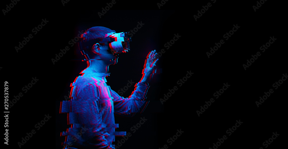 Man is using virtual reality headset. Image with glitch effect. - obrazy, fototapety, plakaty 