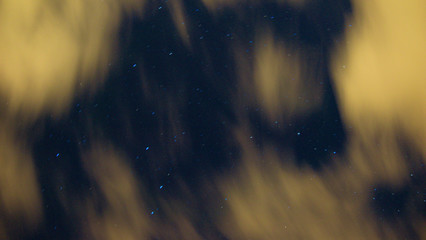 night sky with stars and clouds