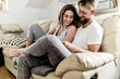 © SVP Productions - husband and wife relaxing on the couch