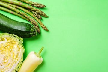 Wall Mural - Green vegetables on green background