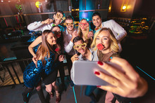 Group Of Friends Partying In A Nightclub Make Selfie Photo