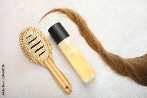 Light Brown Hair Bamboo Comb And Hair Spray Buy This Stock Photo