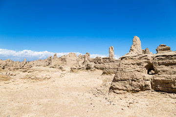 Wall Mural - Jiaohe Ruins, Turpan, China. Ancient capital of the Jushi kingdom, it was a natural fortress atop a steep cliff leaf-shaped plateau between two river valleys and is more than 2000 years old