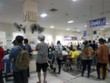 © Duangjit - Many patients come to see the doctor and wait for the hospital service .. lens blurred.