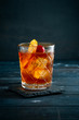 © Andrey - Whiskey sour cocktail with a slice of orange, cherry and ice, a classic alcoholic drink