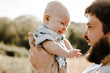 © Erin Drago Photography/Stocksy - Dad and Baby Boy Smiling at Each Other