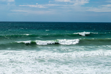 Beautiful stormy sea landscape on the beach summer photo on the sea coast. Dramatic cloudy sky, stormy weather. Summer holiday and vacation concept for tourism.  Free space for your text.