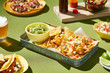 © 365mm/Stocksy - Tacos with pickled cucumbers and guacamole.