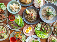 Traditional Northern Thai Food Cooked Fresh. Pork Laab, Larb, Mushrooms, Spicy Chile Soup, Beef Meatballs, Flank Steak, Soft Boiled Egg, Papaya Salad.