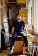 © W2 Photography/Stocksy - Approachable  man in a loft storage room