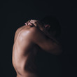 © Studio Firma/Stocksy - Portrait of a naked man's back