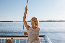 Woman Enjoying Summertime On Cruise Ship