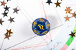 Astrology Dice with symbol of the planet Saturn on Natal Chart Background