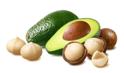 Wall Mural - avocado and macadamia nuts isolated on white background. horizontal composition