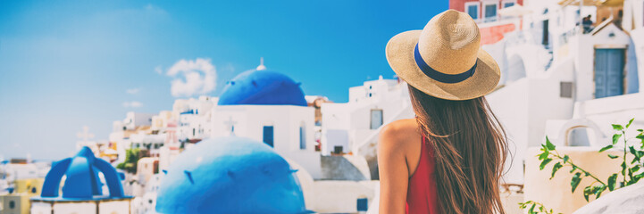 Wall Mural - Santorini vacation honeymoon girl enjoying view of 3 blue domes famous tourist attraction in Europe. Banner panorama.