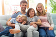 © pikselstock - Happy young family with two children at home