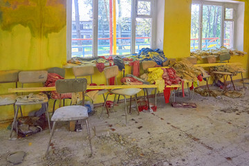 Room with yellow walls in an abandoned children's camp. Soviet pioneer camp in Ukraine.