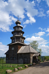 Wall Mural - The 17th century wooden church of the Tikhvin icon of the Mother of God in the town of Torzhok. Tver region, Russia. Sunny summer day