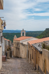 Wall Mural - The village of Sedini, province of Sassari , Sardinia, Italy.  Known for its medieval architectural jewels and the prehistorical domus de Janas Sa Rocca