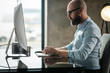 © Nejron Photo - Middle-aged designer working in office