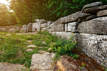 Ancient tiled dolmen in the valley of the river Jean. Monument of archeology megalithic structure