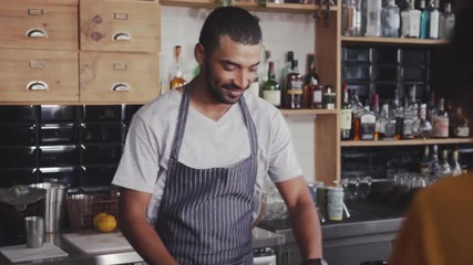 Poster - Barista offering coffee to the customer in cafe