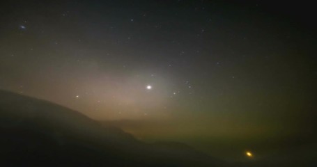 Wall Mural - astro time lapse milky way galaxy stars over the alps, stormy sky, fog and clouds abstract colorful 