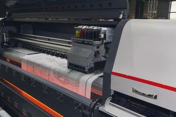 Wall Mural - large format printing machine in operation. industry