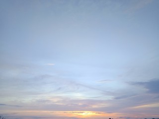 Wall Mural - beautiful sunset and evening sky with clouds for background