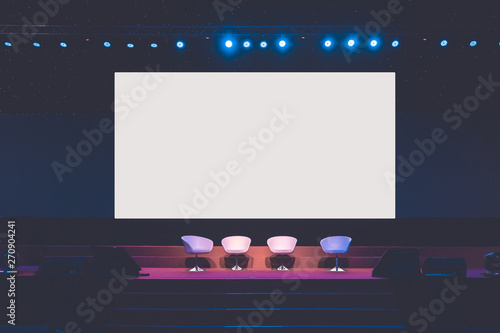 Fotografía chairs on stage in conference hall at business event or seminar meeting, busine