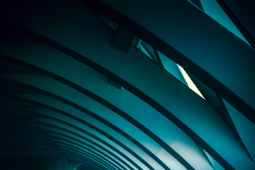 Wall Mural - background of bluish tones and cold and dark atmosphere with columns and lines of wavy geometry.