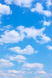 Fototapeta Paryż - Beautyful blue sky with white clouds -  vertical background