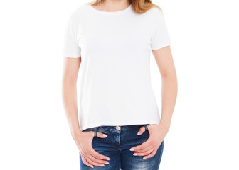 Wall Mural - Young slim girl with a beautiful body in a white Tshirt on a white background